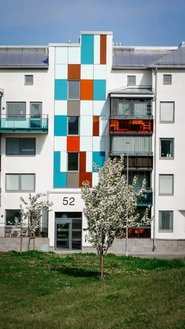 Window cleaner works on a high-rise glass building, delivering spotless results.